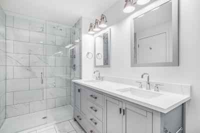 Bathroom featuring smart mirror and lighting